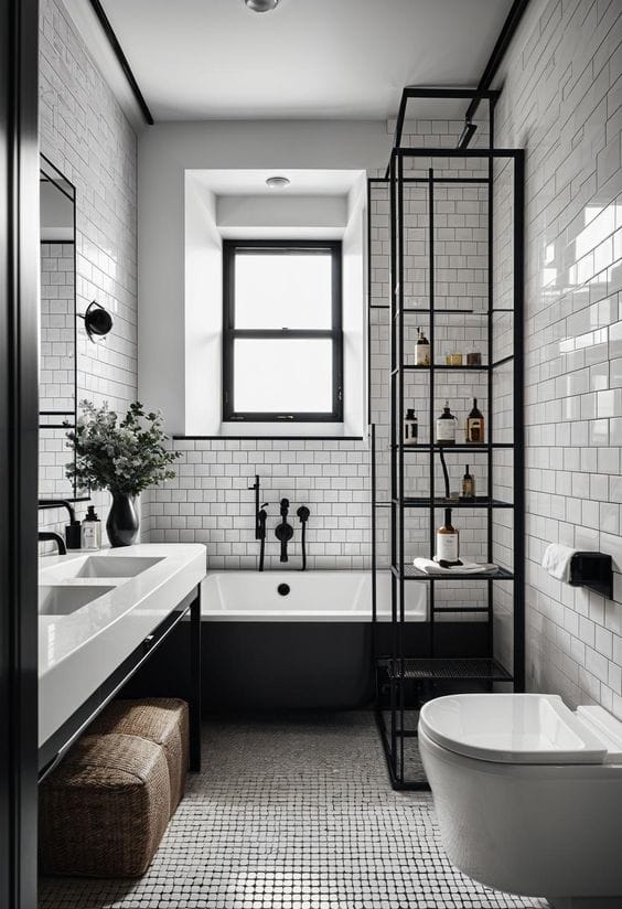 Salle de bain blanche et noire avec carreaux de carrelage et accessoires métalliques